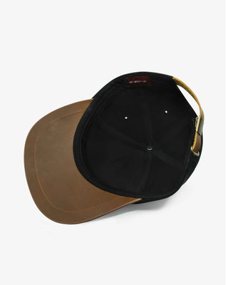 Leather brim 6 panel cap seen from below. 